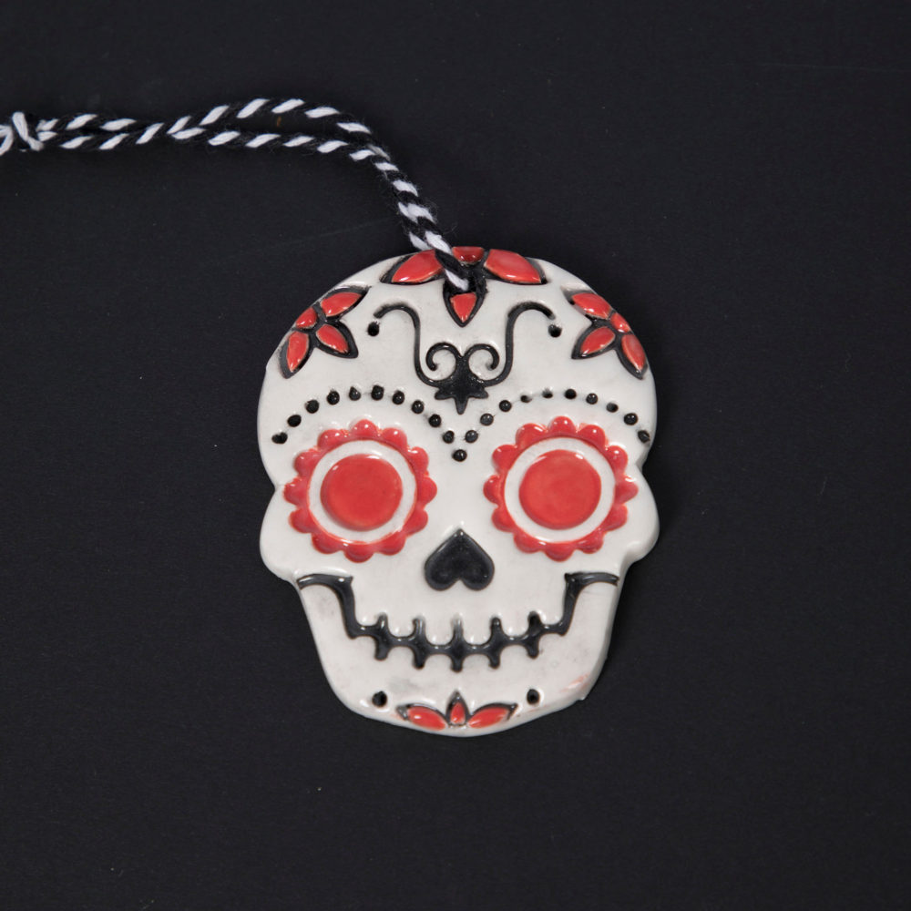 Red Painted Daisy Skull